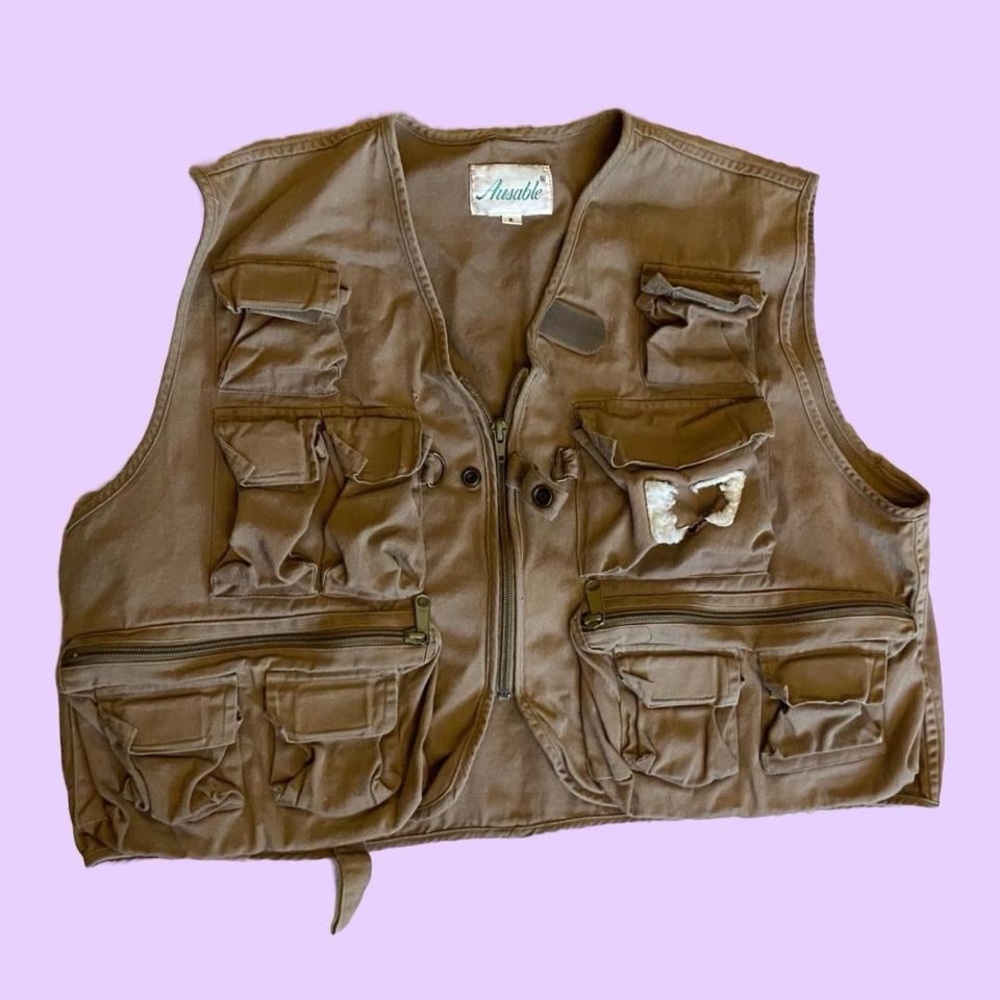 Tan and brown utility fishing vest with multiple pockets 🔥